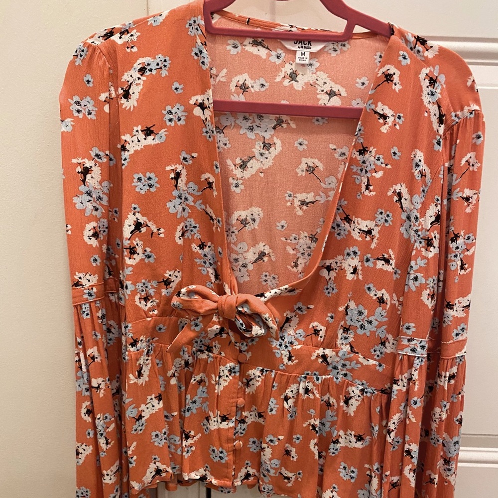 Floral flowing sleeved top